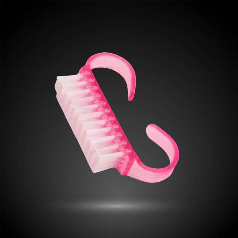 Petite brosse à ongles pour enlever la poussière de limage